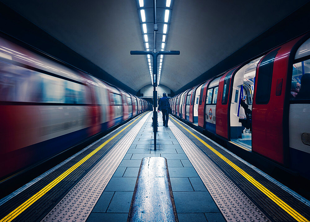 One stationary and one underground train in motion, London Tube Station, Clapham Common, Clapham, London, England, United Kingdom, Europe