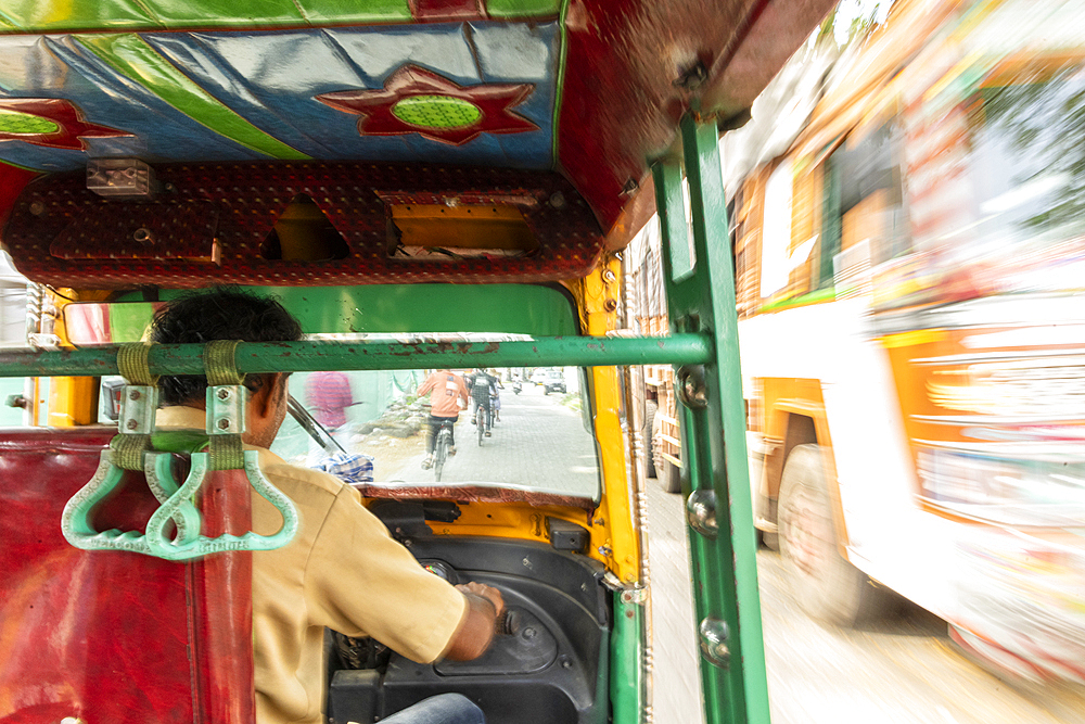 Travelling in the back of an Auto or Tuk Tuk, Fort Kochi, Kerala, India