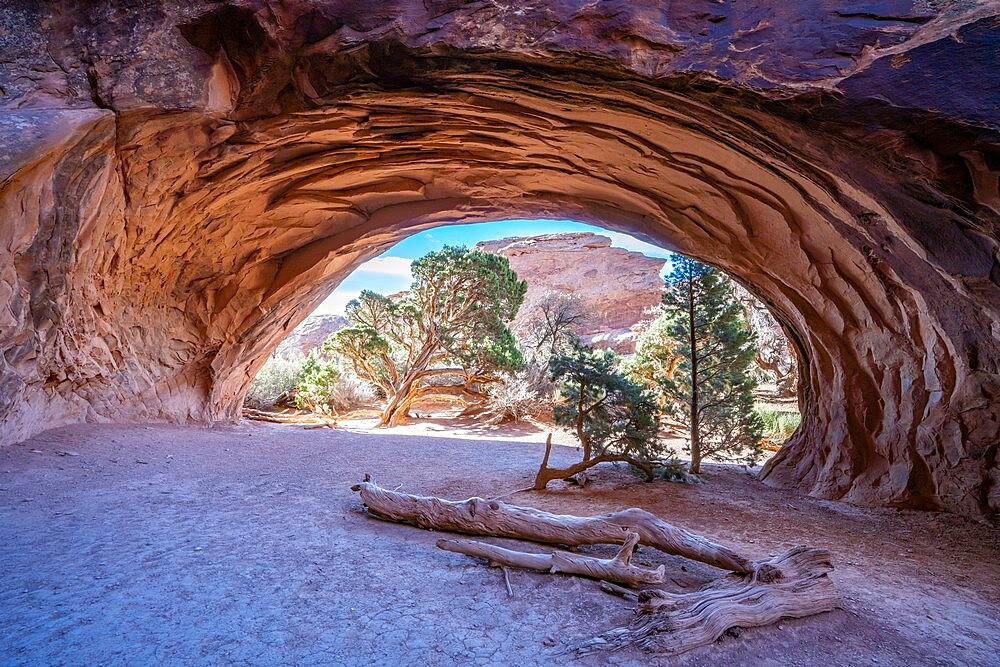 Landscape view through Navajo Arch, Arches National Park, Utah, United States of America, North America