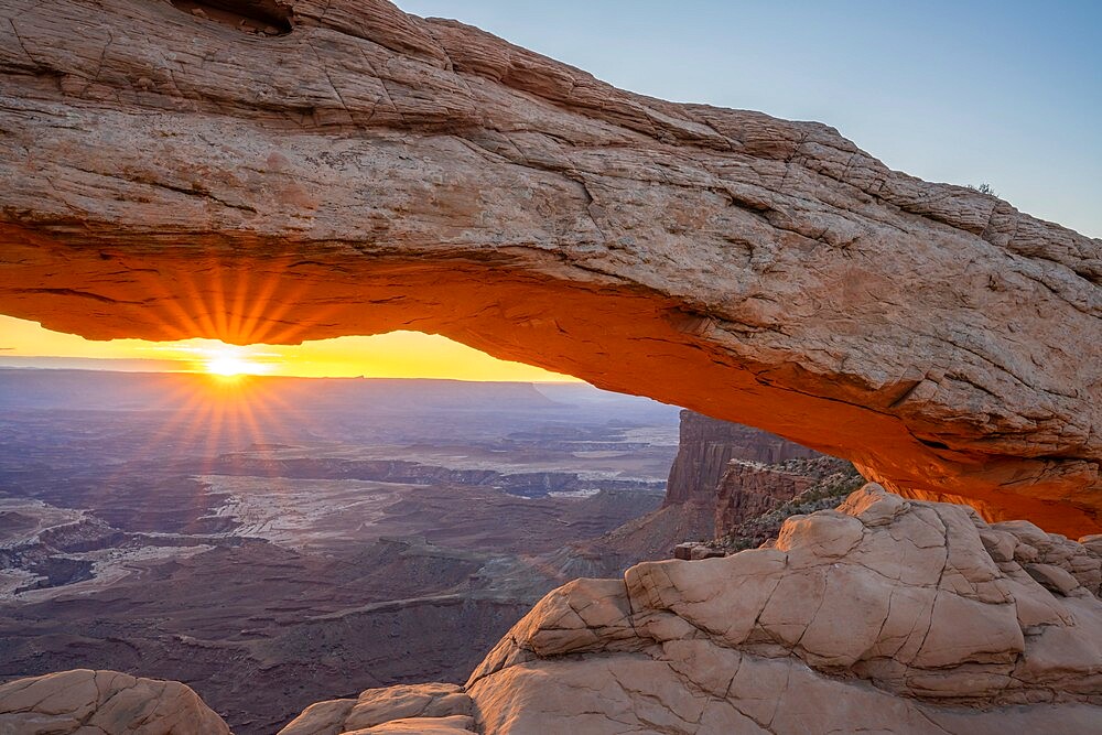 Close up view of canyon through Mesa Arch at sunrise, Canyonlands National Park, Utah, United States of America, North America