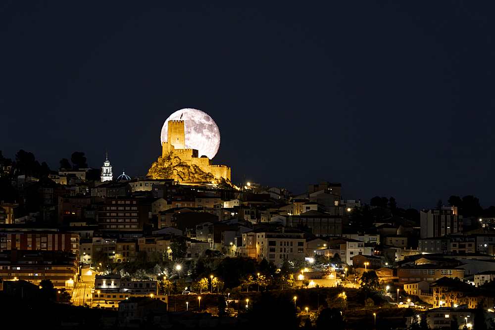 Moonrise of a full moon over Banyares Castle in Sierra Mariola, Alicante Province, Spain, Erope