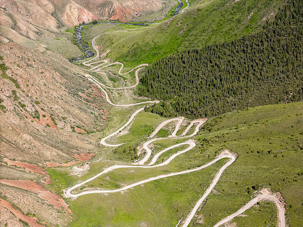 Aerial view of the winding mountain road at Kalmak-Ashu Pass, Kyrgyzstan, Central Asia, Asia