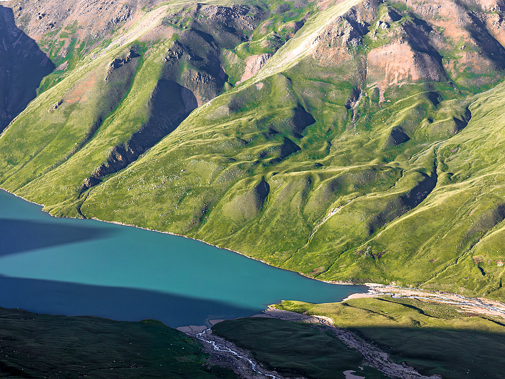 Aerial View of Kol Ukok Lake surrounded by Green Mountains under a blue sky, Kyrgyzstan, Central Asia, Asia