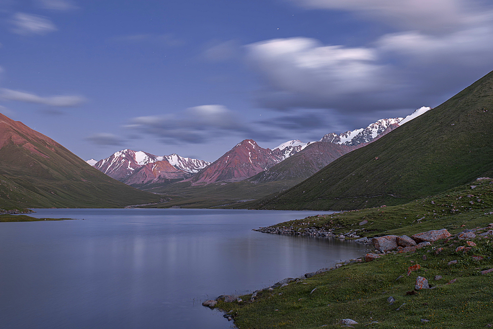 Tranquil evening at a high-altitude Kol-Ukok lake surrounded by majestic mountains in Kyrgyzstan, Central Asia, Asia