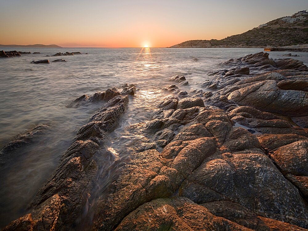 Sunset on the sea and rocks, Antiparos Island, Cyclades, Greek Islands, Greece, Europe