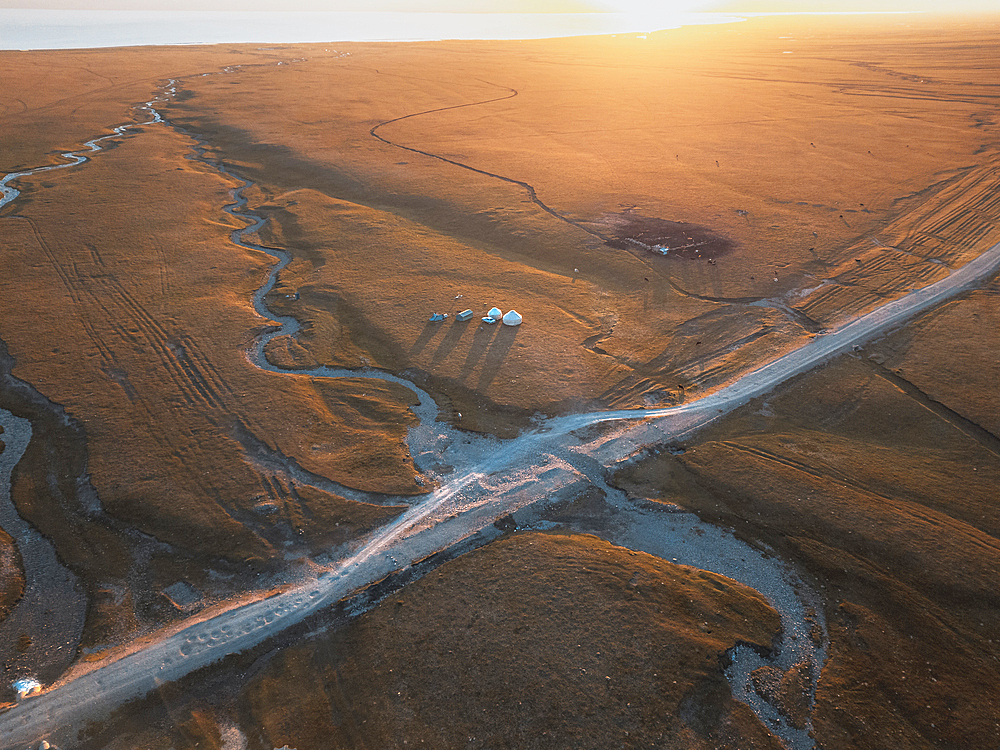 An aerial view of the Song Kol lake area at sunrise, Kyrgyzstan