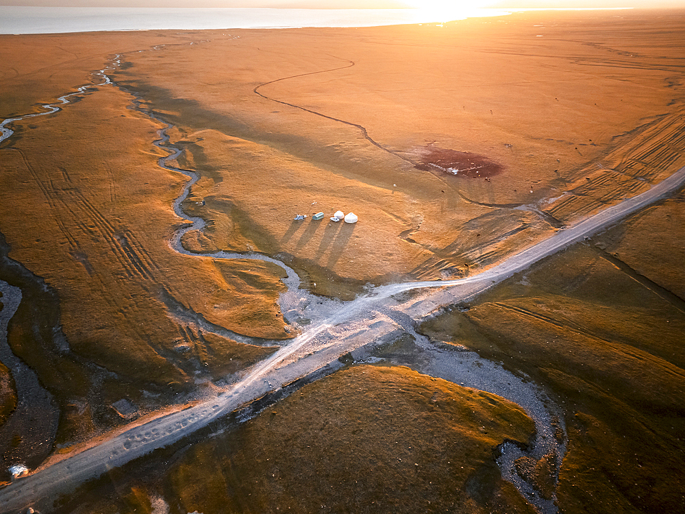 An aerial view of the Song Kol lake area at sunrise, Kyrgyzstan