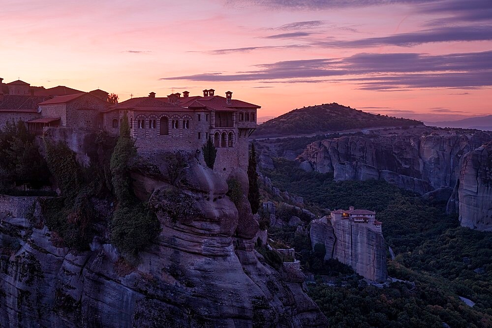 A pink sunrise on Varlaam Monastery, Meteora, UNESCO World Heritage Site, Thessaly, Greece, Europe