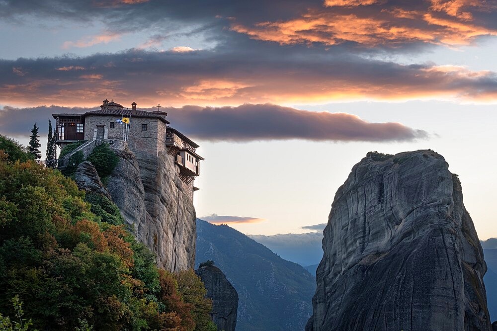 Clouds at sunset over Roussanou (St. Barbara) Monastery, Meteora, UNESCO World Heritage Site, Thessaly, Greece, Europe