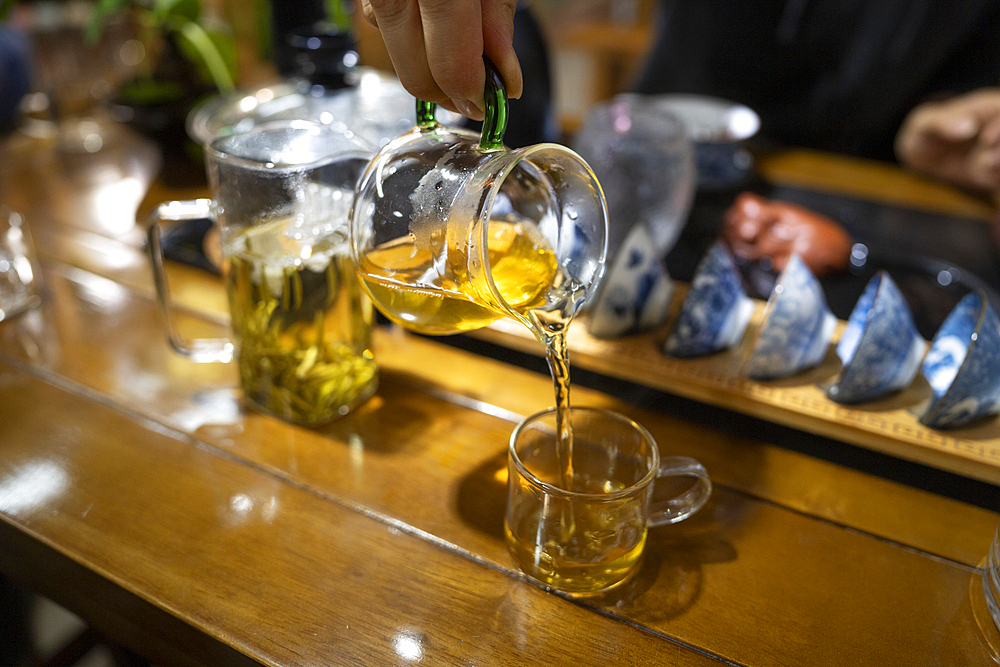 Tea ceremony - tea poured in a glass