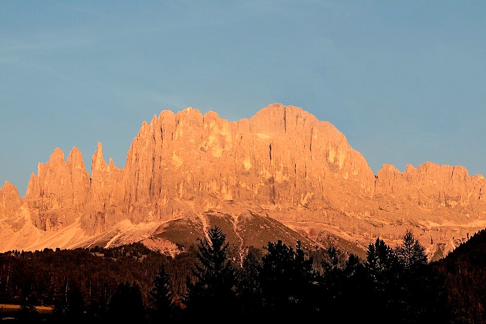 Orange sunset named enrosadira on Catinaccio mountain, Val di Tires, Bolzano, Italy, Europe