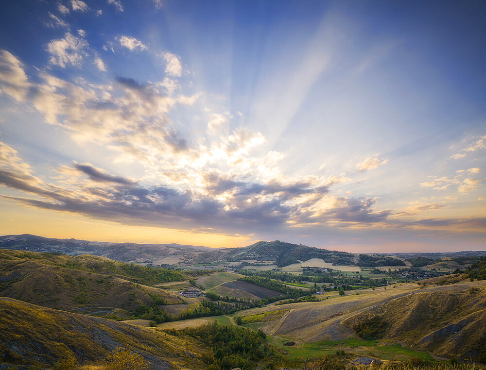 Countryside landscape at sunset with a sky full of clouds, Emilia Romagna, Italy, Europe