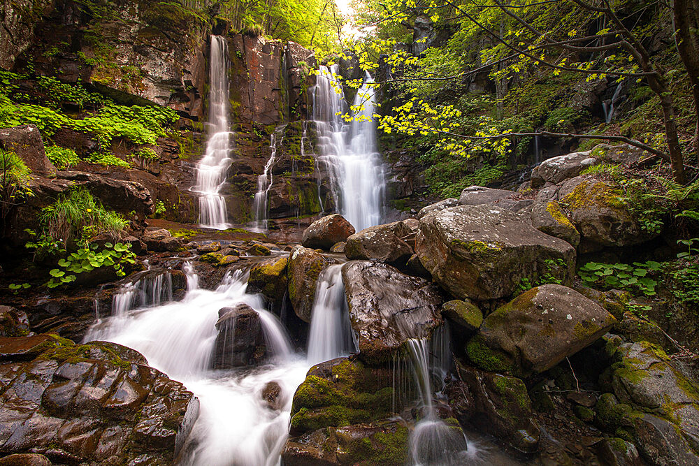 Dardagna waterfalls in the wood, flowing between rocks, Emilia Romagna, Italy, Europe