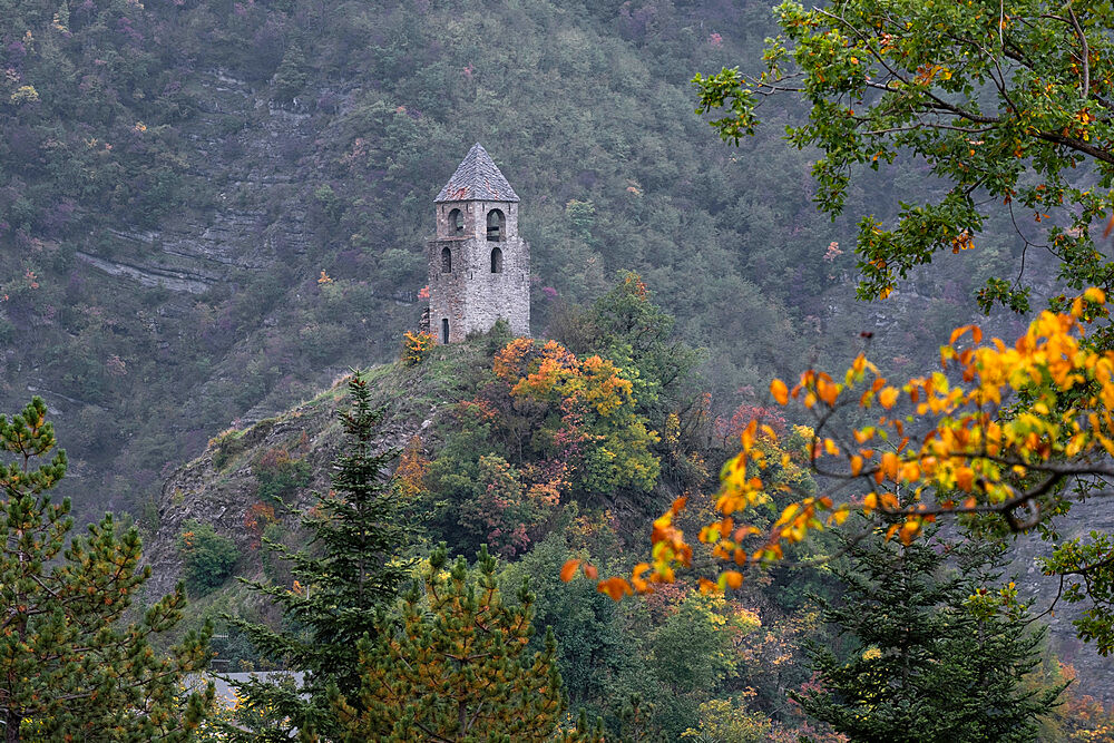 The ancient medieval tower of Rocca Corneta on the top of a hill in autumn, Emilia Romagna, Italy, Europe