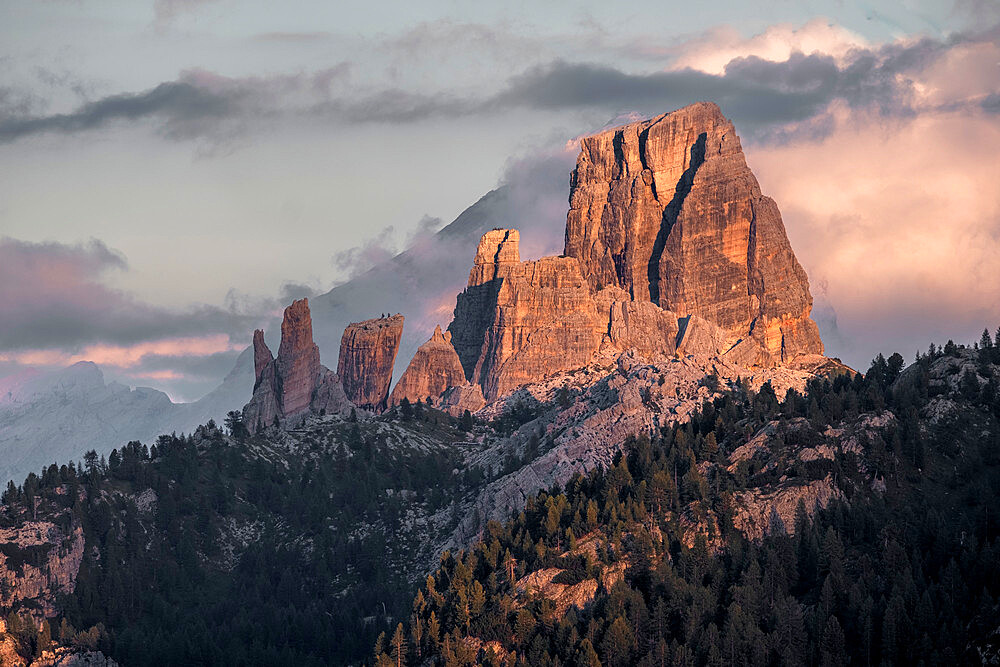 Sunset on 5 Torri (Five Towers) mountains in the Dolomites with some colored clouds, Dolomites, Italy, Europe