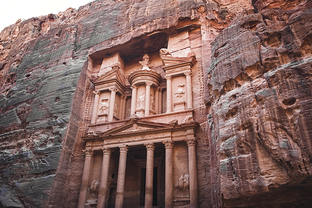 Treasury (Al Khazneh) monument carved into the stone on the side of a mountain, Petra, UNESCO World Heritage Site, Jordan, Middle East