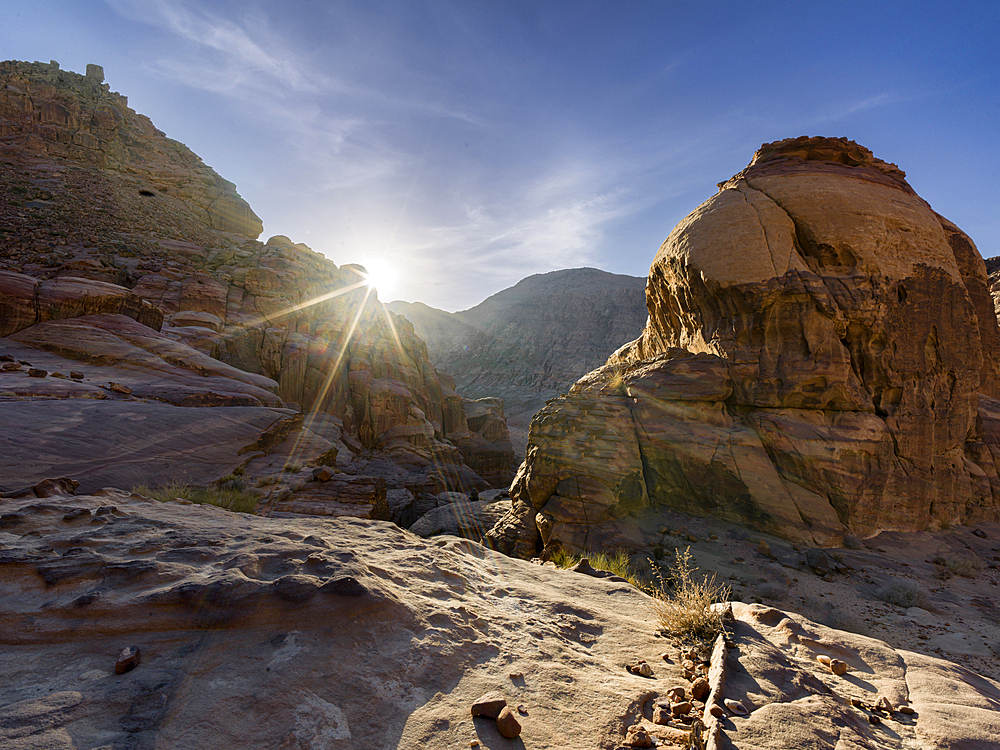 Rocky mountains with the sun star in the Wadi Rum, Jordan, Middle East