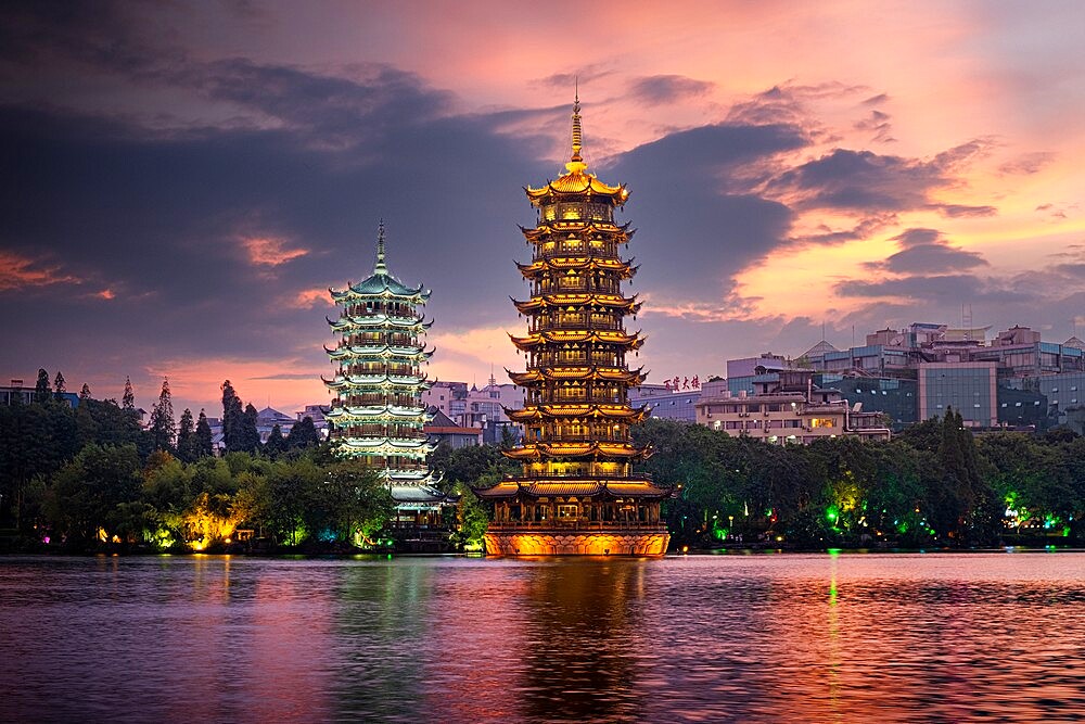 Sun and Moon pagodas at sunset in Guilin, Guilin, Guangxi, China, Asia