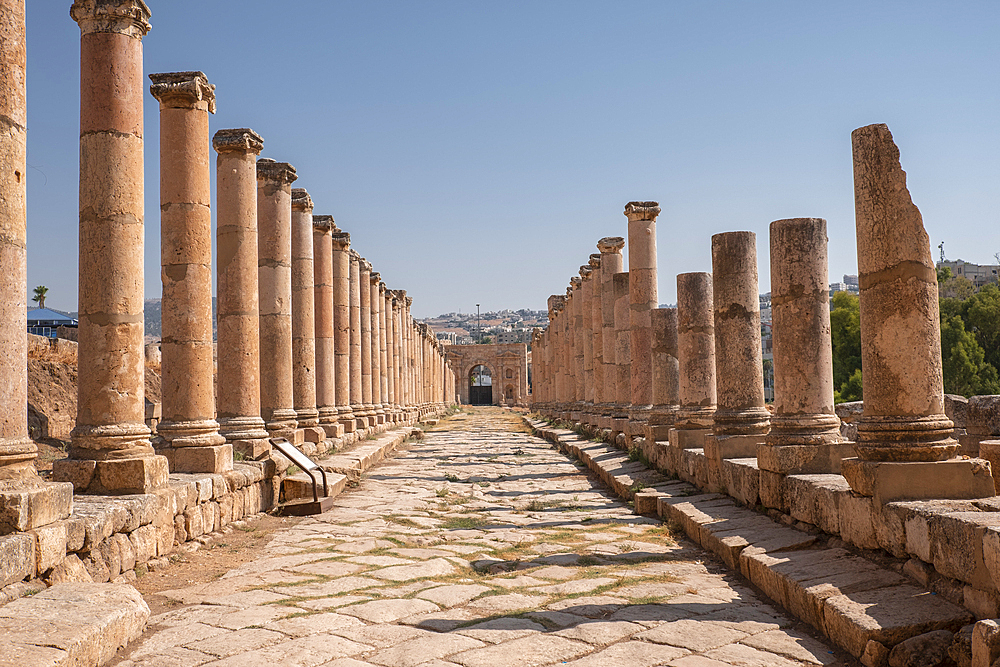 Ancient Roman stone road with a colonnade, Jerash, Jordan, Middle East