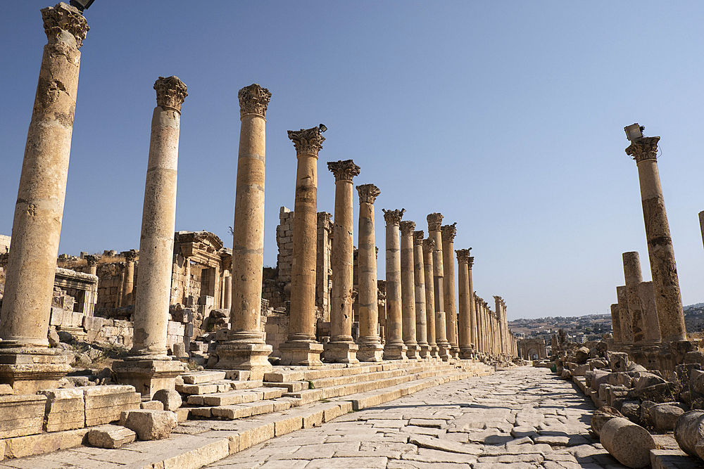 Ancient Roman stone road with a colonnade, Jerash, Jordan, Middle East