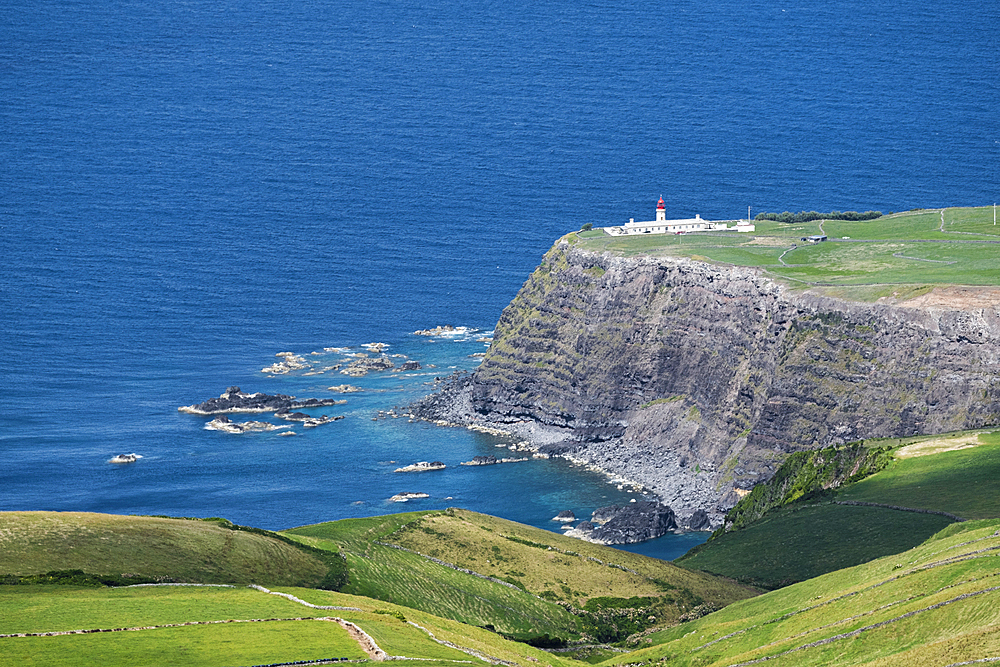 Farol de Albarnaz from top of a cliff, Flores island, Azores islands, Portugal, Atlantic Ocean, Europe