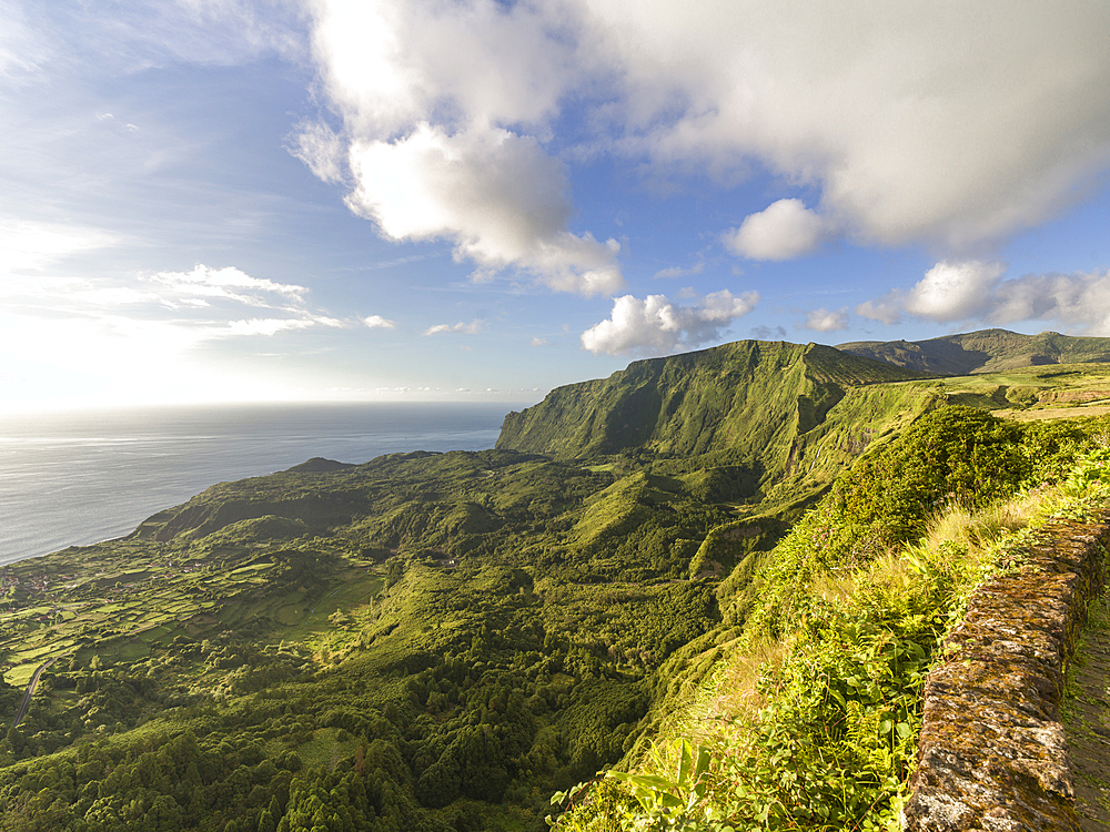 Green Mountains on a sunny evening seen from Miradouro Craveiro Lopes on Flores island, Azores islands, Portugal, Atlantic, Europe