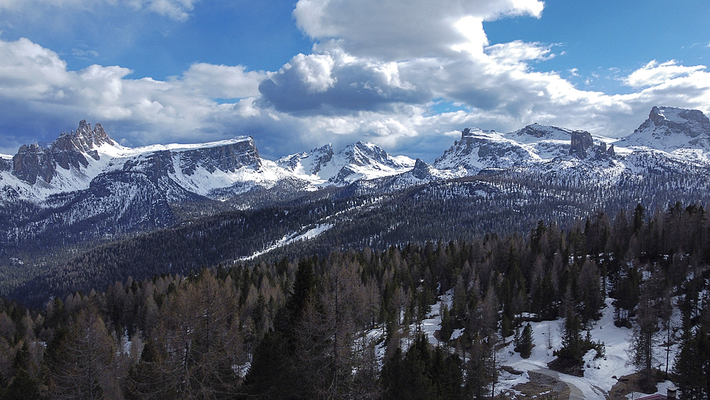 Panorama view of Croda da Lago, Lastoni di Formin, Ra gusela, Nuvolao, Cinque torri and Cortina d'Ampezzo Dolomites mountain covered in pristine snow, Italy, Europe