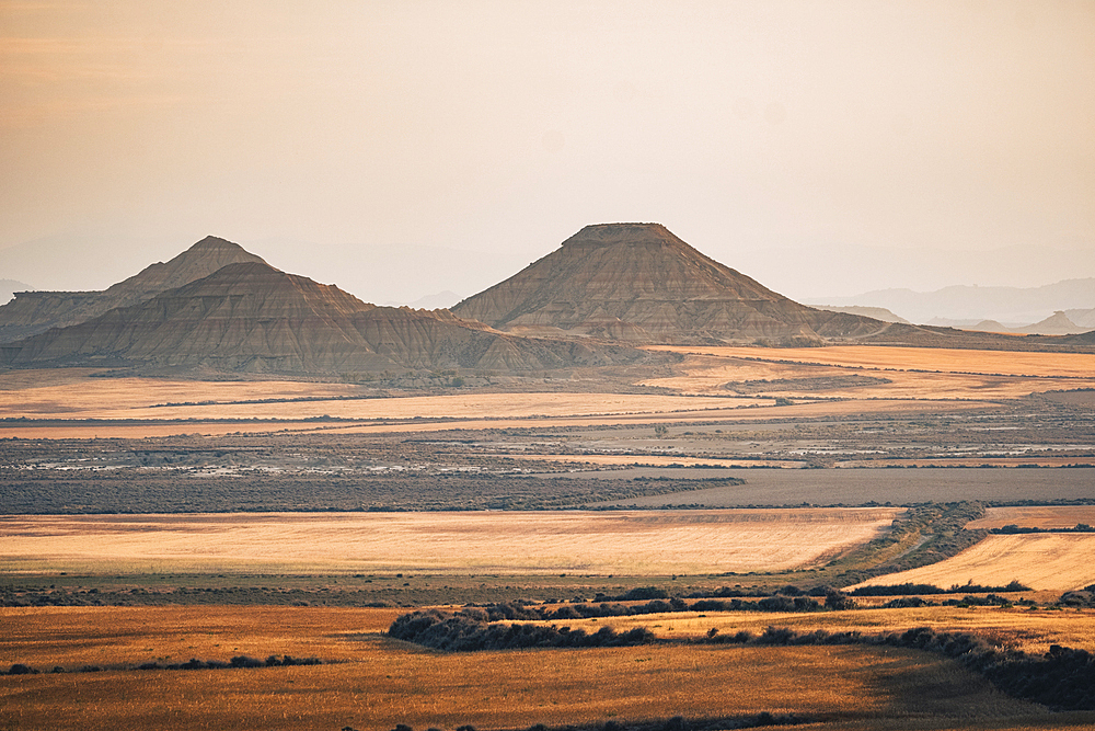 Badlands of Bardenas Reales desert mountains at sunrise, Navarre, Spain, Europe