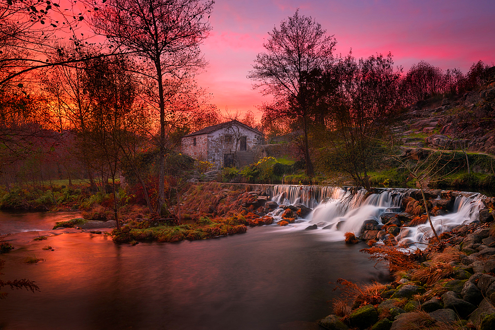 Mondim de Basto waterfall with a mill house at sunset, Norte, Portugal, Europe