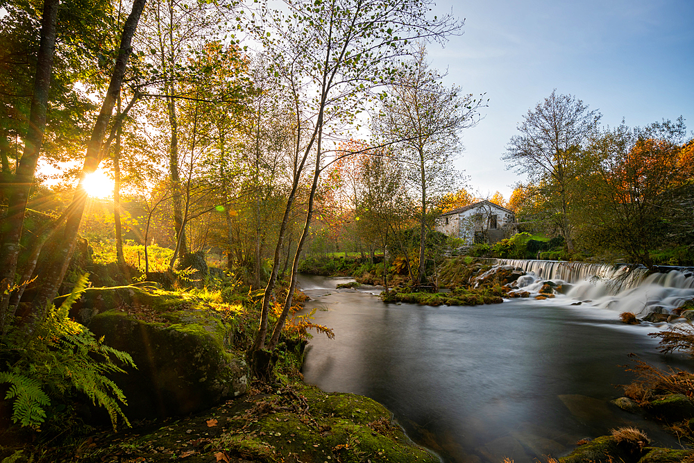 Mondim de Basto waterfall with a mill house at sunset, Norte, Portugal, Europe