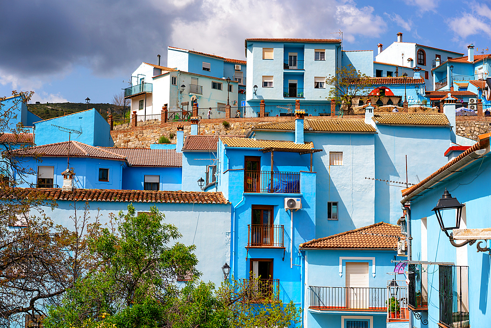 Village street in blue painted Smurf house village of Juzcar, Pueblos Blancos region, Andalusia, Spain, Europe