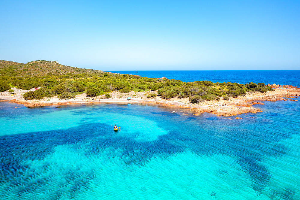 Drone aerial view of a kayak on the turquoise water, Sardinia, Italy, Mediterranean, Europe