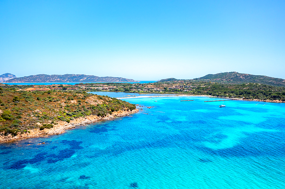 Drone aerial view of Salina Bamba beach with white sand and turquoise water, Sardinia, Italy, Mediterranean, Europe