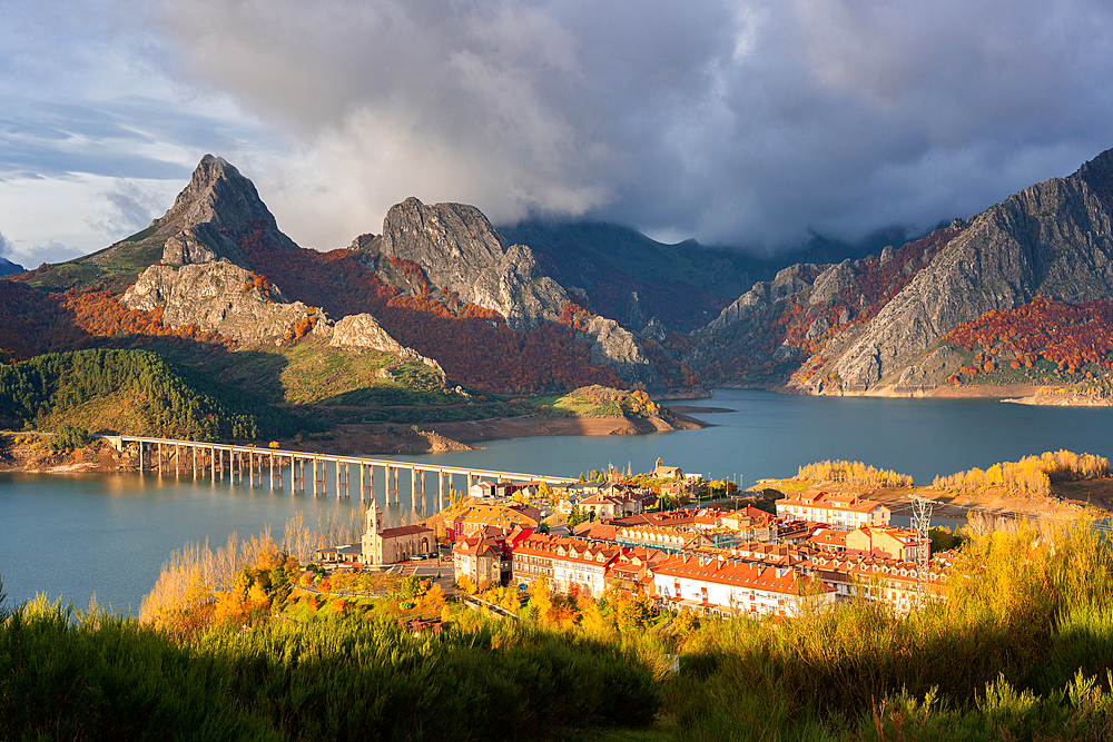 Riano cityscape at sunrise with mountain range landscape during autumn in Picos de Europa National Park, Leon, Spain, Europe