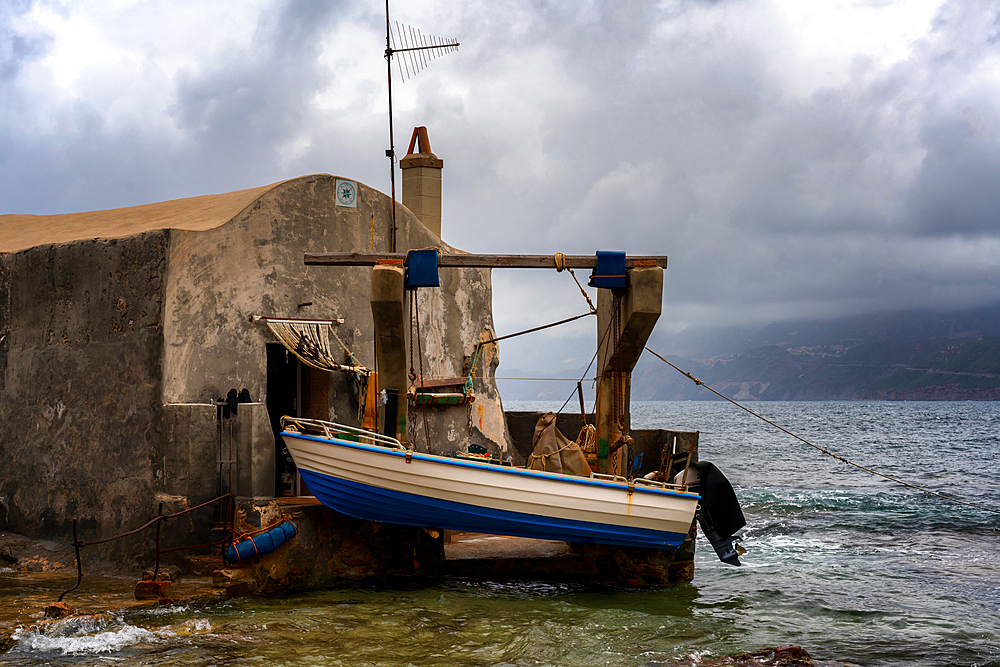 Old Fisherman's house (Casa del Pescatore) in the middle of the sea in Porto Paglia in the coast, Sardinia, Italy, Mediterranean, Europe