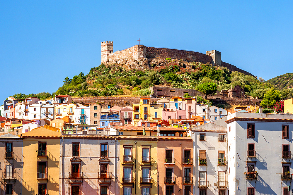 Bosa city colorful buildings with castle on top of the hill and Vecchio bridge crossing Temo river, Bosa, Sardinia, Italy, Mediterranean, Europe