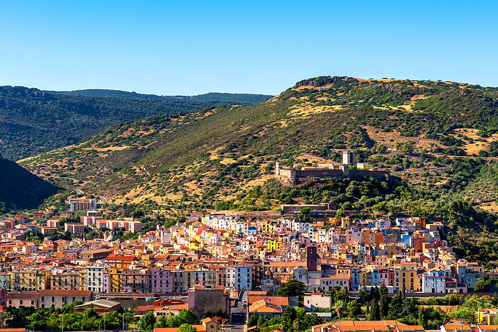 Bosa colorful city with castle on top of the hill seen from outside of the city, Bosa, Sardinia, Italy, Mediterranean, Europe