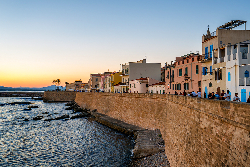 Alghero city wall and historic buildings at sunset, Alghero, Sardinia, Italy, Mediterranean, Europe