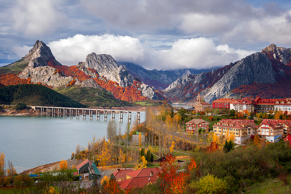 Riano cityscape at sunrise with mountain range landscape during Autumn in Picos de Europa National Park, Leon, Spain, Europe