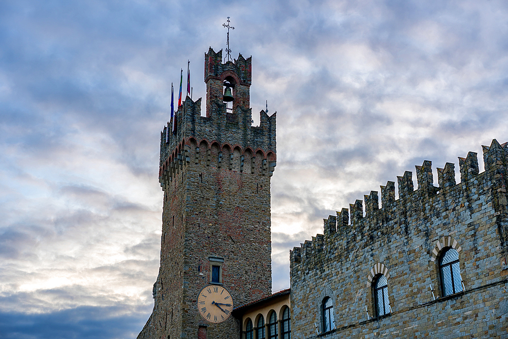 Priori Palace iconic stone tower of Arezzo at sunset, Arezzo, Tuscany, Italy, Europe