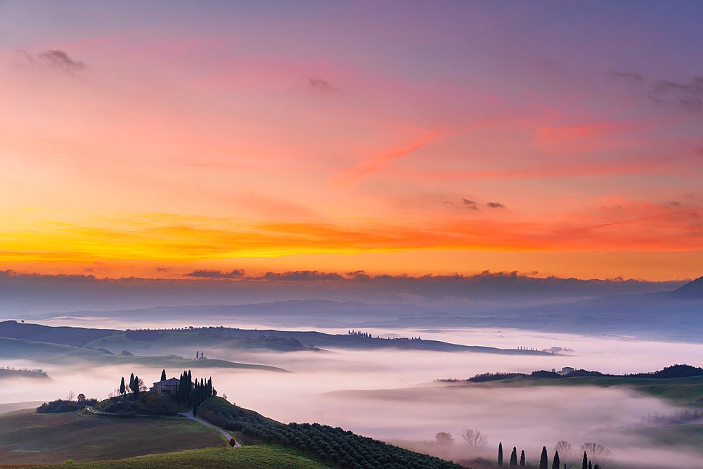 Traditional house of Tuscany in Val d Orcia at sunrise, in Italy