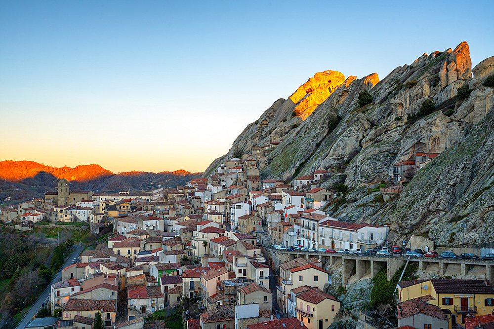 Pietrapertosa historic village with stone houses in the mountains at sunrise, in Italy