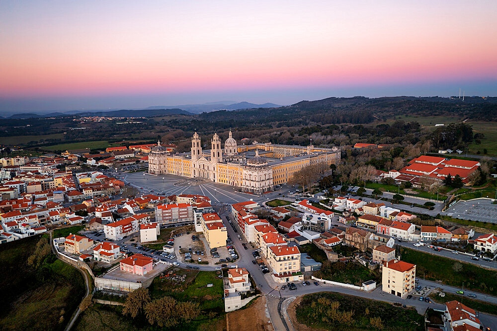 City drone aerial view at sunset with iconic Palace, Mafra, Portugal, Europe