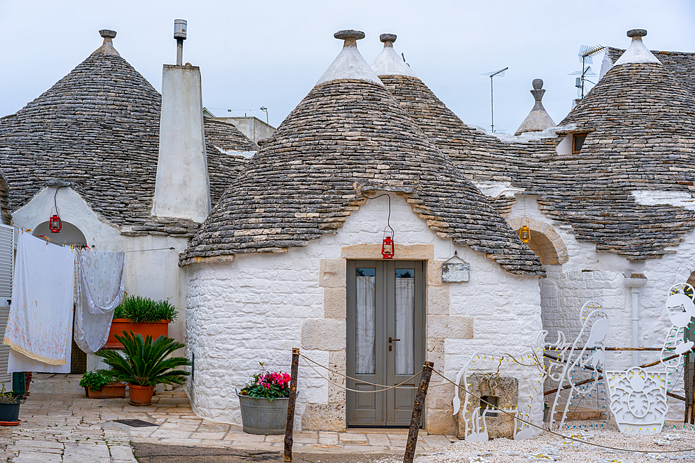 Alberobello iconic old Trullo and Trulli white houses with stone ceilings in conical shape, UNESCO World Heritage Site, Alberobello, Apulia, Italy, Europe