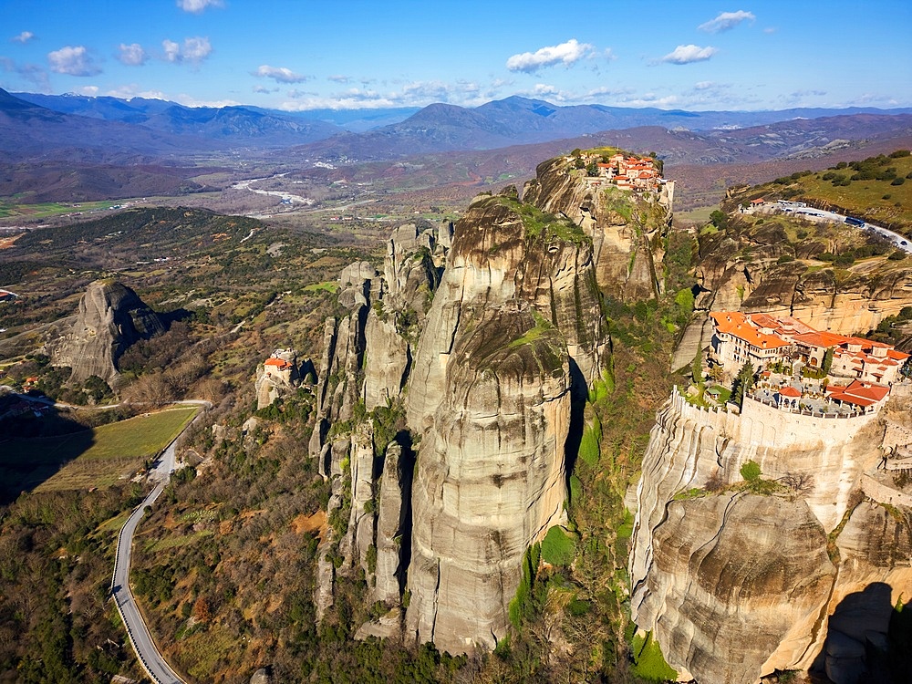 Meteora ancient holy monastery of Varlaam, Saint Nicholas Anapafsas and Great Meteoron drone aerial view in Unesco site in Kalabaka, Greece