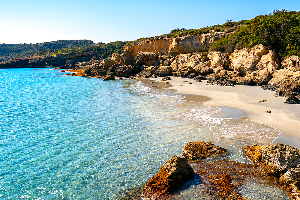 Petrified forest Agia Marina Agios Nikolaos Geopark beach with turquoise water in the south of Greece