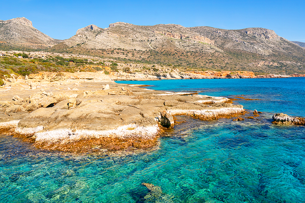 Petrified forest Agia Marina Agios Nikolaos Geopark beach with turquoise water in the south of Greece