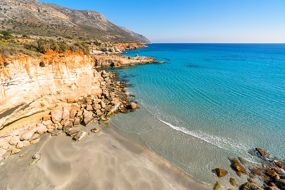 Petrified forest Agia Marina Agios Nikolaos Geopark beach with turquoise water in the south of Greece