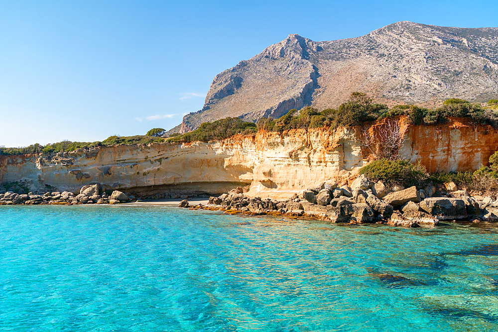 Petrified forest Agia Marina Agios Nikolaos Geopark beach with turquoise water in the south of Greece