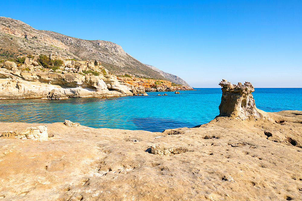 Petrified forest Agia Marina Agios Nikolaos Geopark beach with turquoise water in the south of Greece